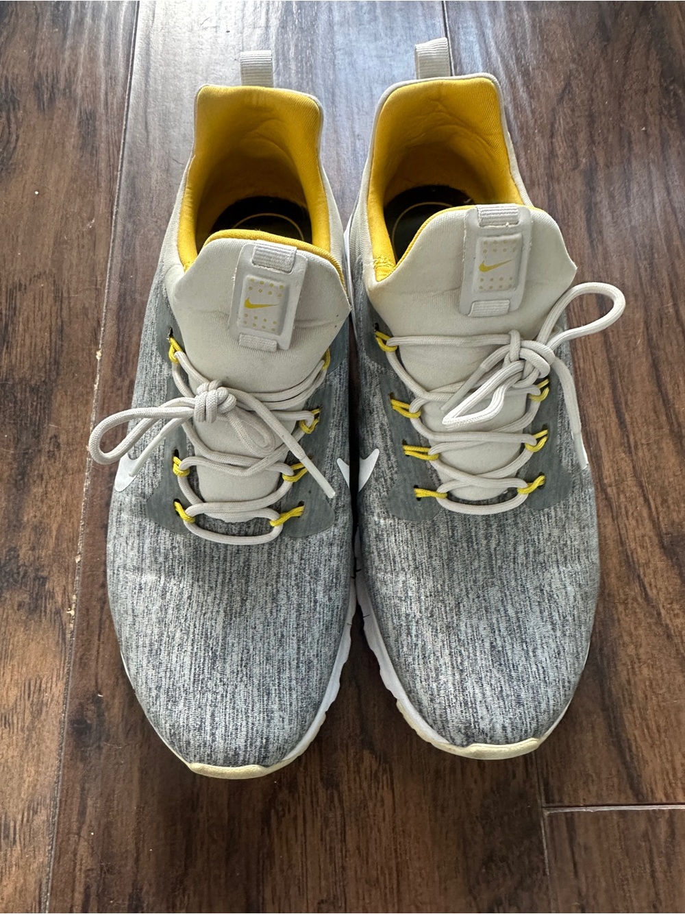 Nike Woman’s Grey Knit Athletic Sneakers with Yellow Accent